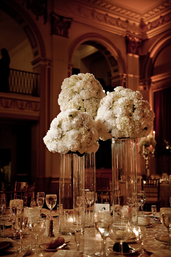 reception tabletop details - white floral centerpieces - photo by New York based wedding photographers Maloman Photographers